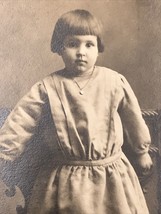 1904-1918 RPPC Young Girl w/ Bowl Cut Wearing Dress on Chair Real Photo Postcard - £11.00 GBP