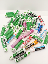 Lot Of 38 Pieces Of Chapstick  New Sealed Spearmint Candy Cane Mango Juicy Grape - £72.13 GBP