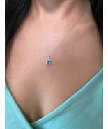 Authenticity Guarantee

14K Solid White Gold Enhanced Blue Radiant Halo ... - $1,648.22 CAD