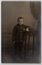 RPPC Darling Little Boy Button Up Uniform Style Coat Sudio Photo Postcard C26 - £7.03 GBP