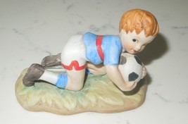 LEFTON BOY SOCCER PLAYER GOALKEEPER CERAMIC FIGURINE - $37.88 MXN