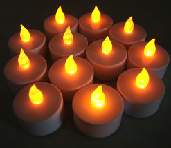 New Flickering 12 Flicker AMBER Light Flameless LED Tealight Tea Candles - $16.14