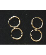 Sterling silver thin twisted Medium Hoop Earrings - $5.00