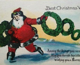 Santa Claus Throws Xmas Wreathes Christmas Postcard Metropolitan News Unused 350 - $13.50