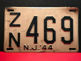 Vtg Metal ZN469NJ44 Automobile/Automotive License Plates White/Black Single - £39.58 GBP
