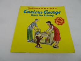 Curious George Visits The Library by Margret Rey &amp; H.A. Rey Soft Cover Book - $2.84