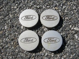 Factory original 1993 to 2002 Ford Escort center caps hubcaps F5C6-1A096-BA - $14.00