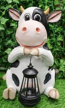 Country Farm Whimsical Holstein Cow Statue Holding Solar LED Lantern Lig... - $79.99