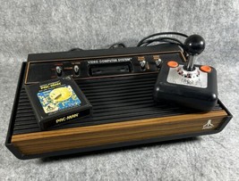 Vintage Atari 2600 Launch Edition Woodgrain Console W/Game &amp; ControllerU... - £29.87 GBP