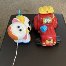 2 Toys a Toys R Us Cow,V Tech Farm &Learn Animal Wagon - $11.30