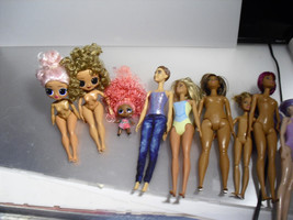 lot of 7 barbies and car - $24.74