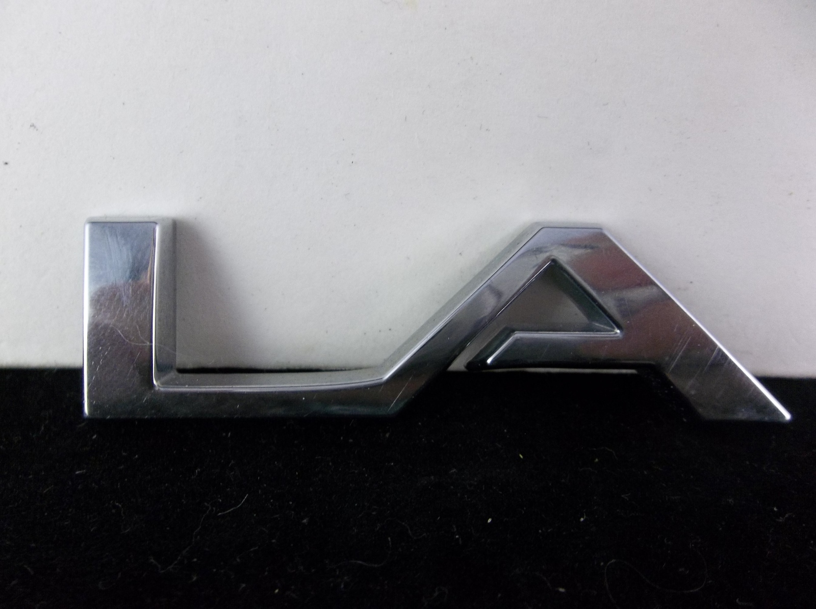 Primary image for 2008-2012 Buick Enclave "LA" Plastic Liftgate Letter Emblem OEM