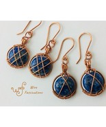 Handmade lapis earrings: copper circle frame cross wire wrapped - €24,82 EUR
