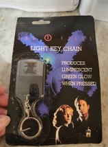 X-Files Light up Keychain XF1005-Produces Green Glow When Pressed-New-SHIP N24HR - £15.41 GBP