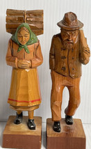 Hand Carved Pair Folk Art Figurals Man And Woman Carrying Stick Bundles And Ax - £38.07 GBP