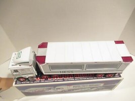 HESS  - 1997 -  TRUCK W/RACE CARS -  NEW IN THE BOX - SH - $21.34