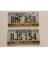 2 Lot-North Dakota 1991-1992 Centennial License Plates, BMF 858 &amp; BJS 154 - $27.28 CAD