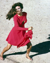 Raquel Welch runs in iconic red dress with hole over chest Fathom 8x10 photo - £8.45 GBP