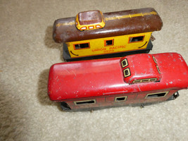 Lot of 2 Vintage O Scale Marx Tin 4 Wheel Caboose Cars NYC 556 UP 3824 - £14.79 GBP