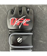 DUSTIN POIRIER SIGNED UFC FIGHT GLOVE. BECKETT WITNESSED - $99.00