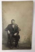 Handsome Young Man Suit and Tie Posing in Chair Portrait RPPC Dapper Dude - £9.43 GBP