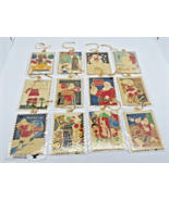 VTG 1994 Complete Set Of 12 Coca Cola Santa Stamp Ornaments 22K Gold Pla... - $74.44