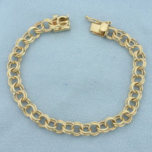 Double Ring Charm Bracelet in 14k Yellow Gold - £723.81 GBP