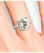 Authenticity Guarantee

GIA 4.77 CT N-COLOR I2 DIAMOND RING 90 PLAT ROUN... - $18,795.15