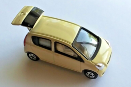 Tomica Daihatsu Mira 1:56 Scale Subcompact Car, with Opening Hatch - $24.74