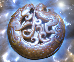 Carved asian amulet thumb200