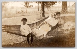 RPPC Woman Relaxing on Hammock Gazing Eyes With Child Postcard E25 - £15.74 GBP