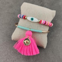 L eye bracelets for women white color handmade rubber rope golden bangle jewelry tassel thumb200