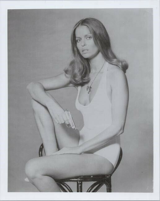 Barbara Bach in low cut swimsuit holding gun The Spy Who Loved Me 8x10