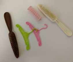 Vintage Barbie 1970&#39;s Accessories. Coat Hangers, brushes and hair roller - $5.00
