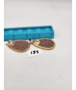 metal and wood dangle earrings - $121.46 MXN