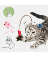 Cat Head Wearing Feather Stick - $255.94 MXN+