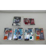 4 Optic Don Russ Rookie Phenoms Cards + 2 Prizm Premier Jersey Cards - $23.75