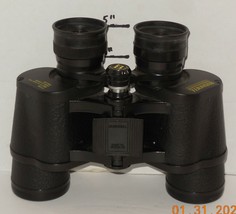 Bushnell Instafocus field of view 7 X 35 420ft @ 1000yds Binoculars - $43.03