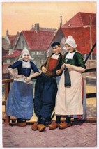 Postcard Traditional Dutch Costumes Male &amp; 2 Females - $9.89