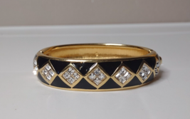 Swarovski Black And Gold Tone Hinged Metal Bracelet With Clear Stones - $65.00