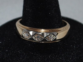 10k Yellow Gold Ring With A Trinity Of Diamonds Set In White Gold On The Band - $334.38