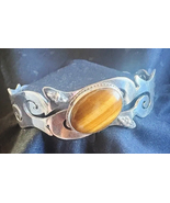 Sterling Silver Cuff Bracelet with Tiger’s Eye and Onyx - $750.00