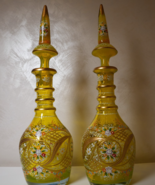 RARE THREE BOHEMIAN CUT AND ENAMELLED LIME-GREEN GLASS PERSIAN DECANTERS... - $40,835.53 MXN