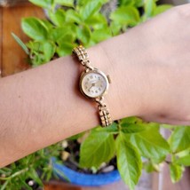 Vintage Timex Classic Womens Womans Gold Round Analog Dainty Stretch Watch - $49.99