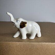 Vintage White Ceramic Elephant Figurine Gold Accents Tiny Animal Statue - $223.79 MXN
