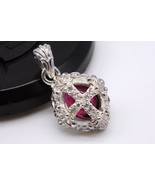 Good Vibrations 925 Sterling Silver Garnet Cross Pendant - $110.97 CAD