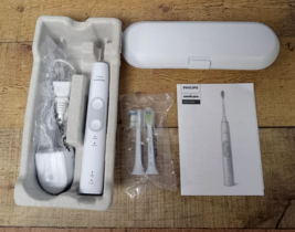 Philips Sonicare Optimal Electric Toothbrush HX686W + Charging Base, Case, Heads - $39.99