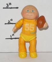 1984 OAA Cabbage Patch Kids Poseable PVC 3" Figure baby Yellow outfit football - $14.50