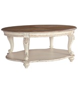 Realyn - White / Brown - Oval Cocktail Table - $6,181.96 MXN
