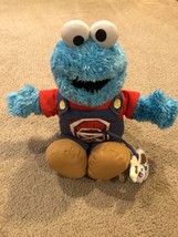 BR2  Fisher-Price Singing Farmer Cookie Monster, 16", Sesame Street, Plush - $9.50